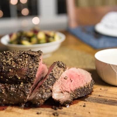Peppercorn Beef Tenderloin with a Roasted Garlic Cream Sauce by Thriving On Paleo