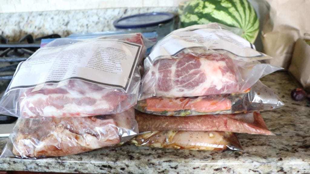 aip paleo freezer meals stacked on counter