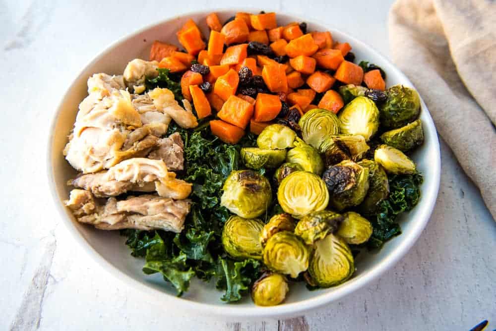 side view of the Brussels sprouts and Candied Carrots Bowl
