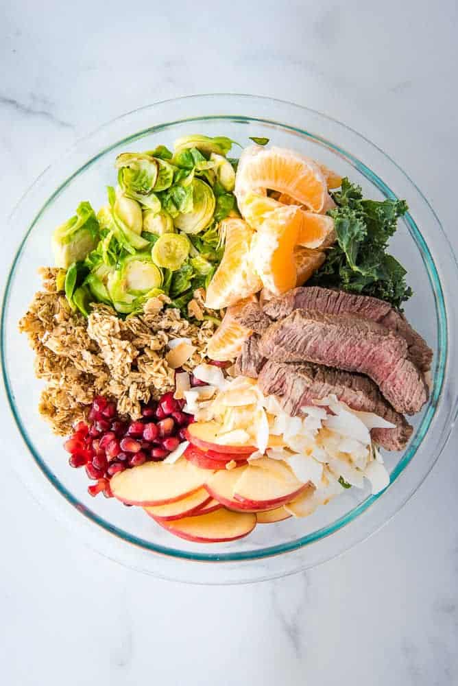 winter steak salad with the cooked ingredients in a bowl