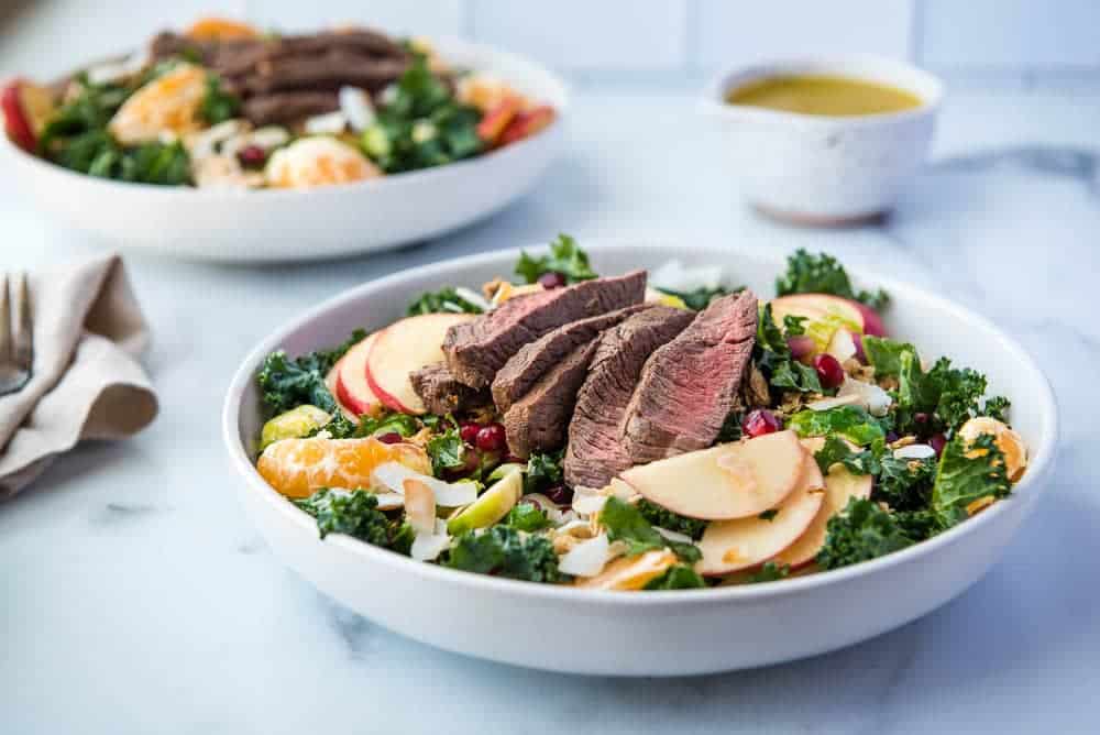 Winter Steak Salad fully assembled from the side, highlighting the steak and apples