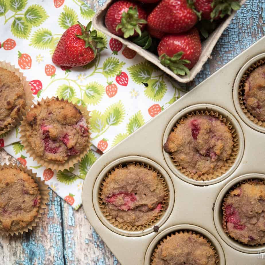  Paleo strawberry muffins made with roasted strawberries and coconut flour - a nut-free, gluten-free snack recipe that is perfect for those summer fruits! with in cupcake tin